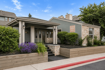 Leasing office with a porch and a sidewalk in front of it  at hilltop view in denver, co